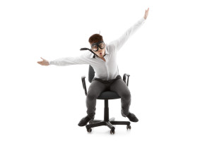 bigstock-Funny-Young-Man-On-Chair-34253222