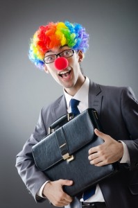 bigstock-Clown-businessman-in-funny-bus-23779583-678x1024